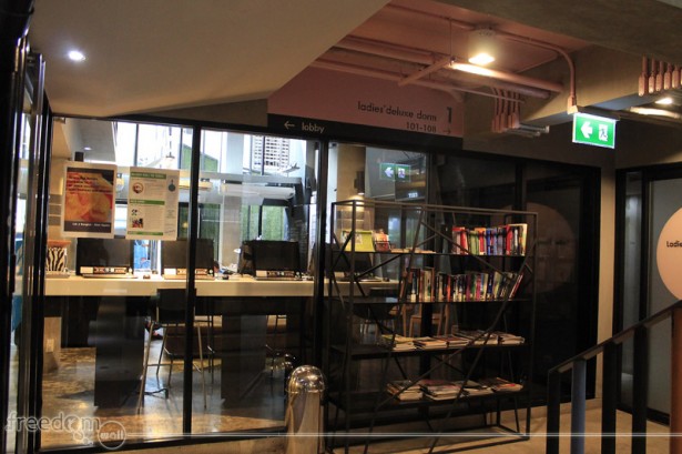 Lub d bookshelf with internet cafe behind