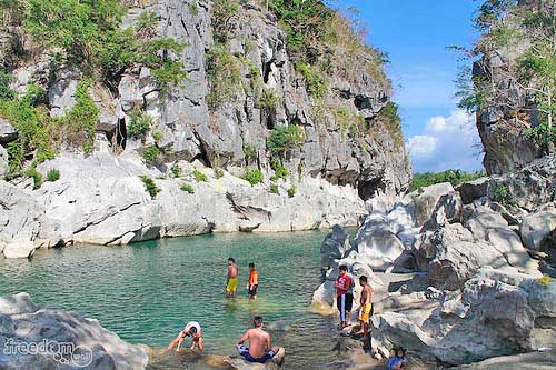 Tourists frequent Minalungao to swim