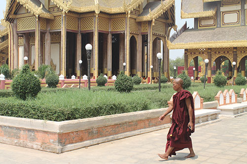 Tourist monk at Thiri Zaya Bumi Bagan Golden Palace