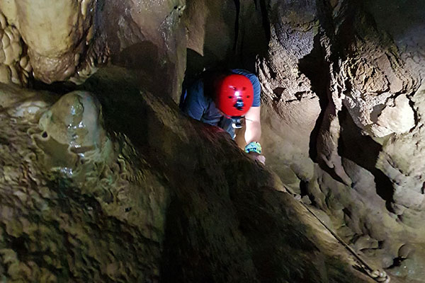Going to lower Langun Cave