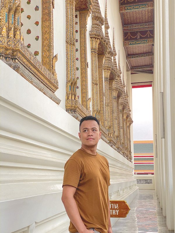Ian Limpangog at Wat Pho (temple of reclining Buddha), Bangkok, Thailand